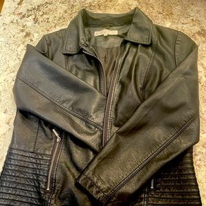Leather (not real leather) short jacket.